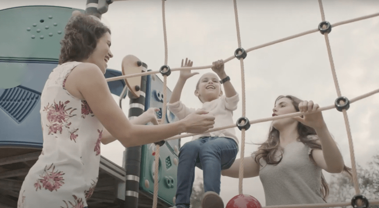 mother with kids at the playground